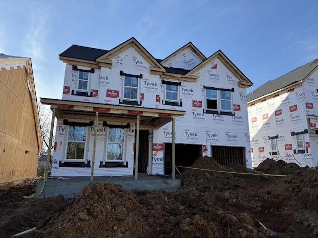 property under construction with an attached garage