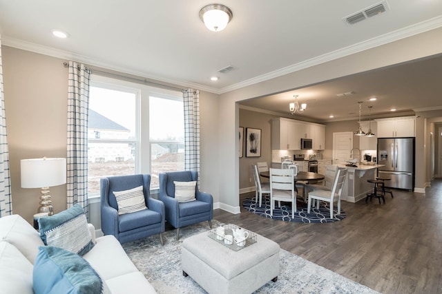 living room with baseboards, visible vents, dark wood finished floors, and crown molding