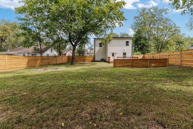 view of yard featuring a fenced backyard