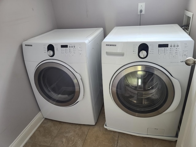 laundry area with laundry area and independent washer and dryer