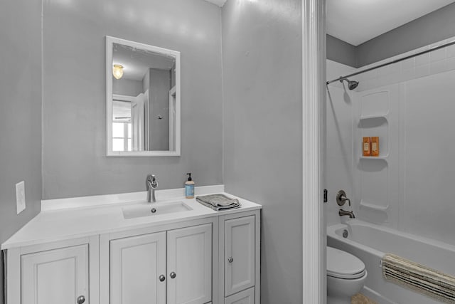 full bath featuring shower / washtub combination, vanity, and toilet