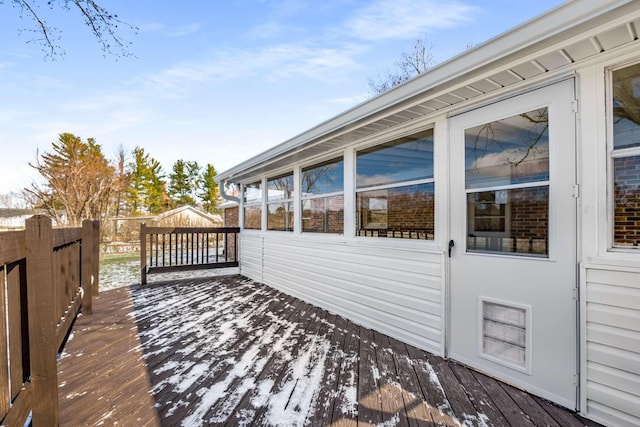 view of snow covered deck