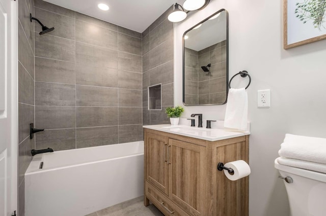 full bath with toilet, shower / tub combination, and vanity