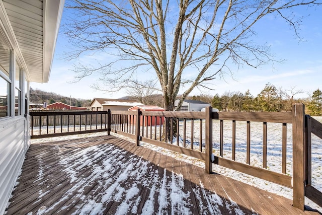 view of snow covered deck