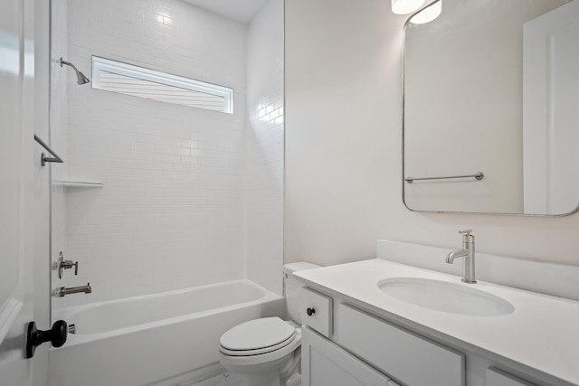 full bath with toilet, vanity, and bathing tub / shower combination