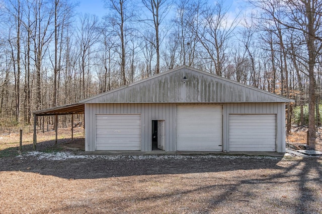 garage featuring a garage and driveway