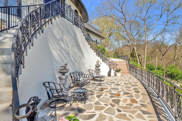 view of patio / terrace with stairs