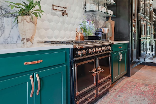 bar featuring double oven, range with two ovens, and backsplash