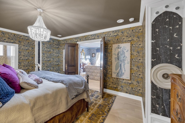 bedroom featuring baseboards, ornamental molding, wood finished floors, and wallpapered walls