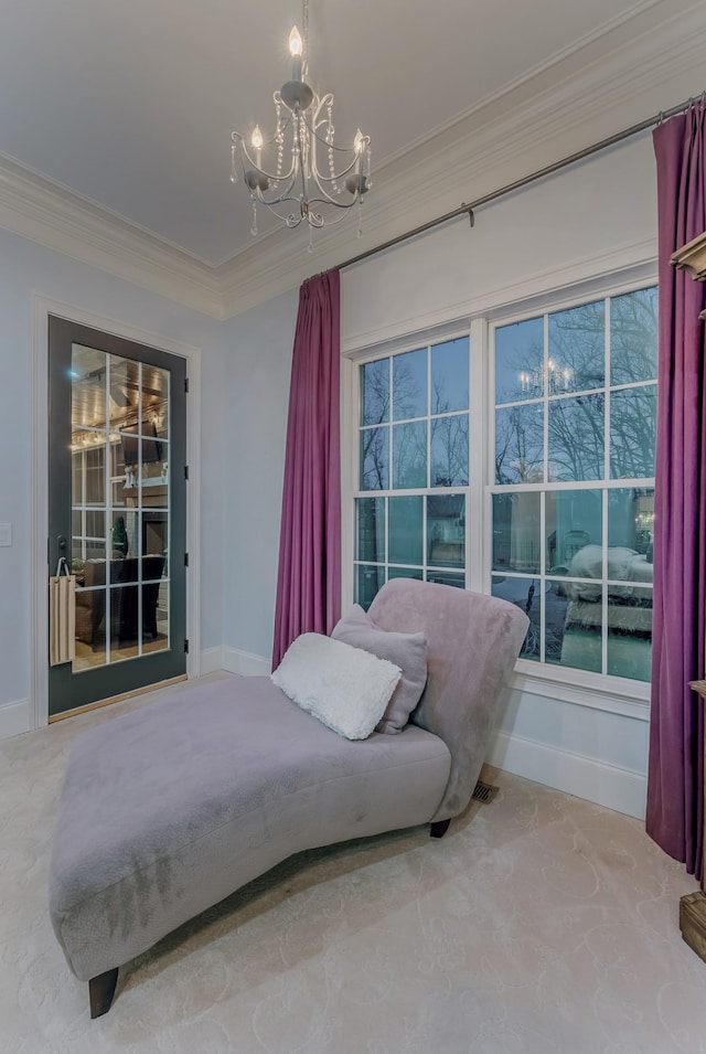 bedroom with a notable chandelier, crown molding, and baseboards