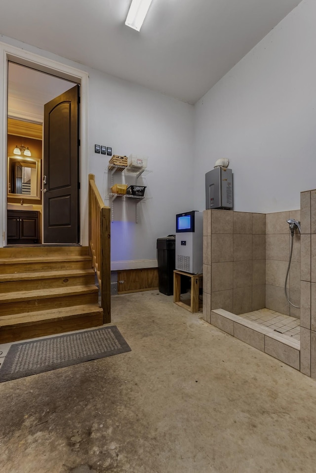 interior space with carpet floors, wainscoting, and stairway