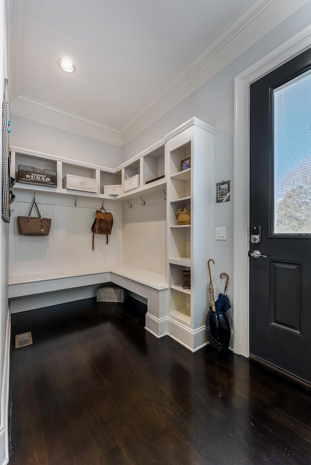 mudroom with baseboards, dark wood-style flooring, and crown molding