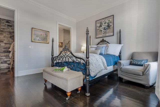 bedroom with baseboards, dark wood-type flooring, and crown molding