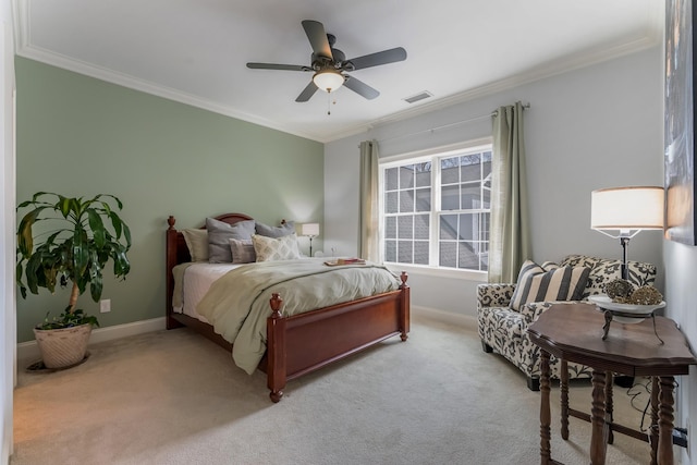 bedroom with ornamental molding, light carpet, visible vents, and baseboards