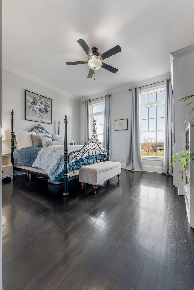 bedroom with ceiling fan, baseboards, ornamental molding, and dark wood finished floors