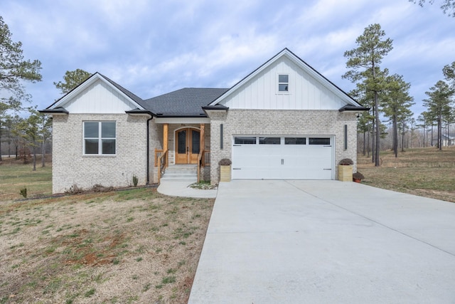 modern inspired farmhouse featuring a garage, brick siding, concrete driveway, board and batten siding, and a front yard