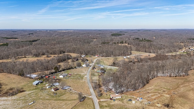 drone / aerial view with a forest view and a rural view