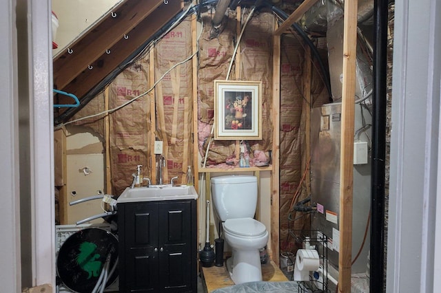 bathroom with toilet and vanity