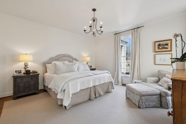 bedroom with baseboards, ornamental molding, and a chandelier