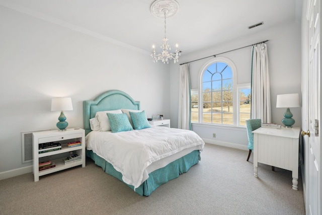 bedroom with an inviting chandelier, baseboards, visible vents, and carpet flooring