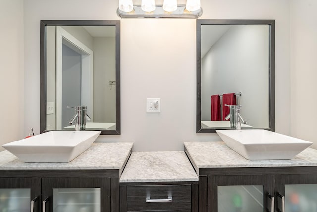 full bath with vanity and a wall mounted AC