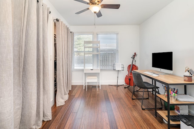 office with ceiling fan, baseboards, and wood finished floors