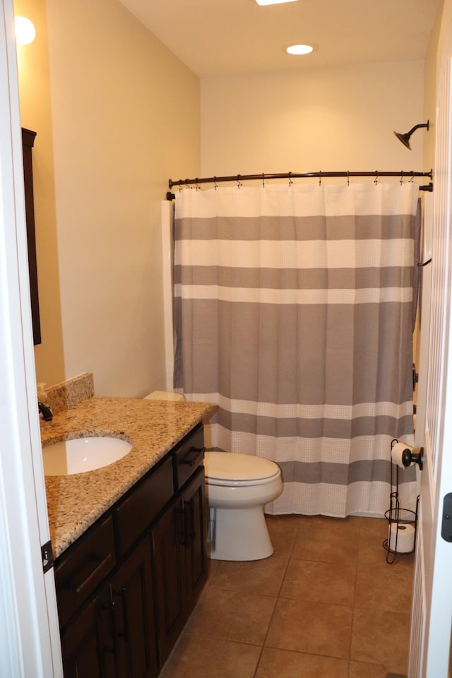 full bath featuring vanity, tile patterned flooring, toilet, and recessed lighting