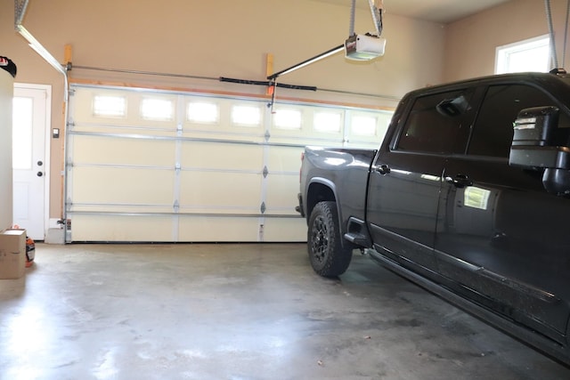 garage featuring a garage door opener