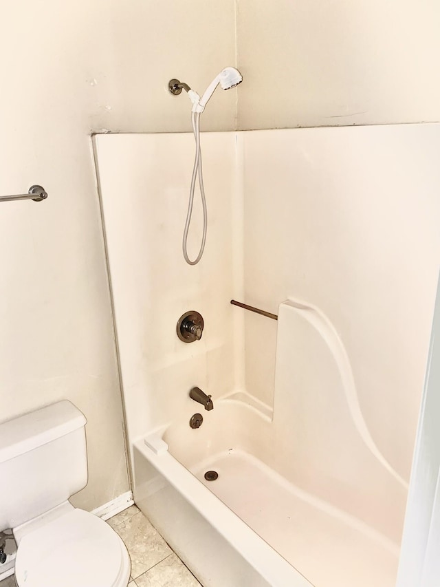 full bath featuring  shower combination, tile patterned flooring, and toilet