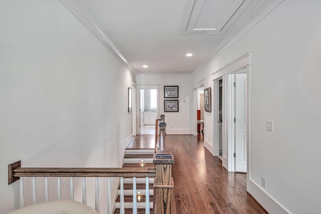 hallway featuring baseboards, dark wood-style flooring, recessed lighting, and crown molding