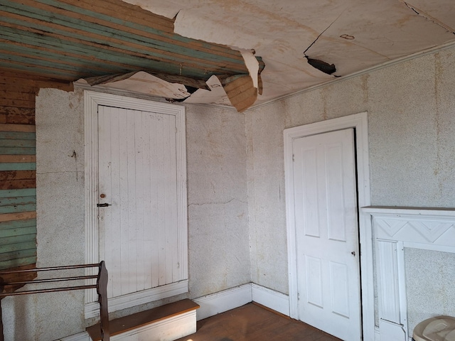 empty room with dark wood-type flooring