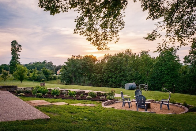 view of yard featuring a fire pit