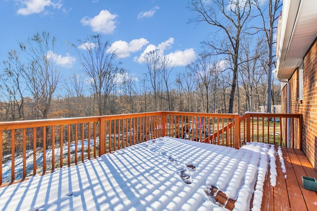 view of snow covered deck