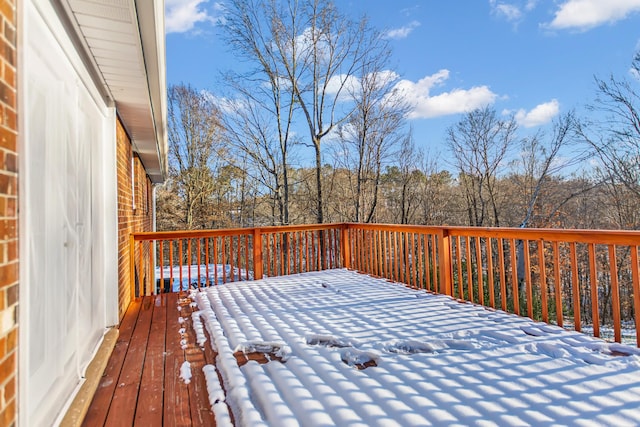 view of snow covered deck