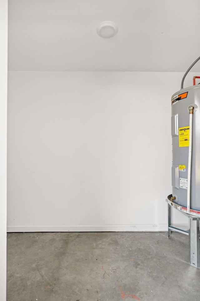 utility room with electric water heater