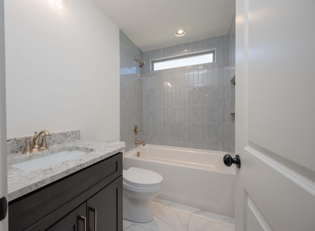 bathroom with marble finish floor, recessed lighting, toilet, washtub / shower combination, and vanity