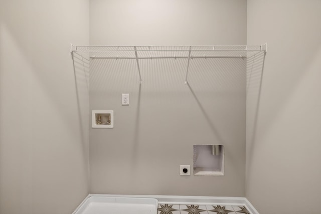 washroom featuring laundry area, baseboards, tile patterned floors, hookup for a washing machine, and electric dryer hookup