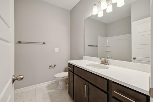 full bathroom featuring toilet, vanity, baseboards, marble finish floor, and a shower