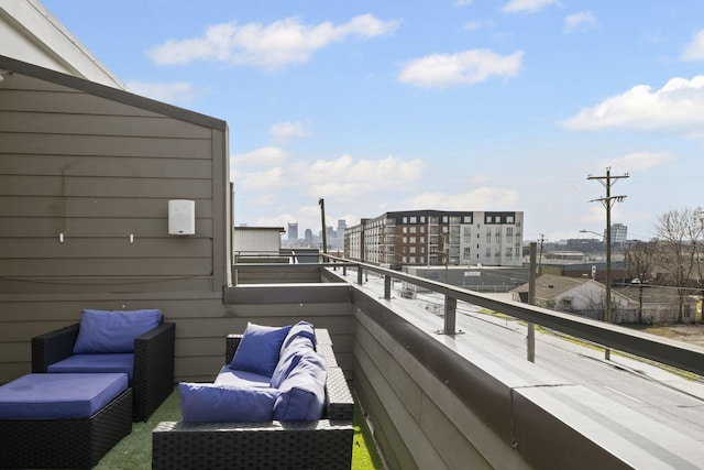 balcony featuring a view of city