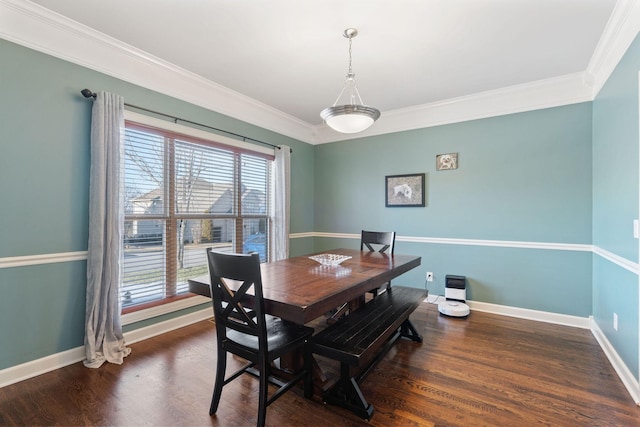 dining area with ornamental molding, dark wood-type flooring, and baseboards