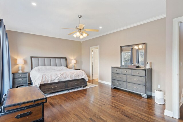 bedroom with ceiling fan, baseboards, dark wood-style flooring, and ornamental molding