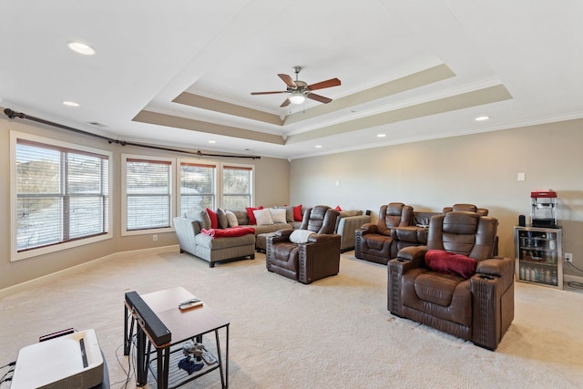 living area with light carpet, a tray ceiling, and wine cooler