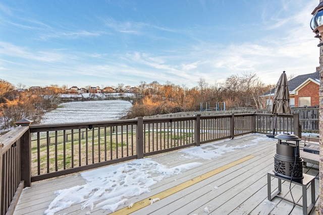 deck with a fenced backyard