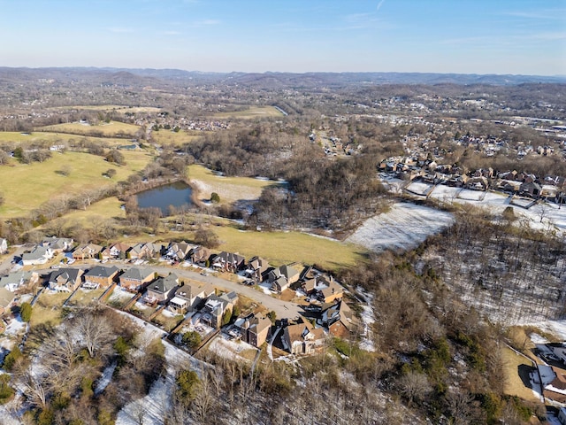 drone / aerial view featuring a water view and a residential view