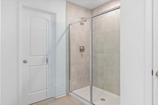 full bathroom featuring a stall shower