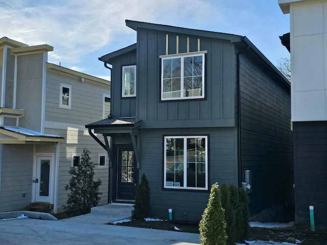 modern home featuring board and batten siding