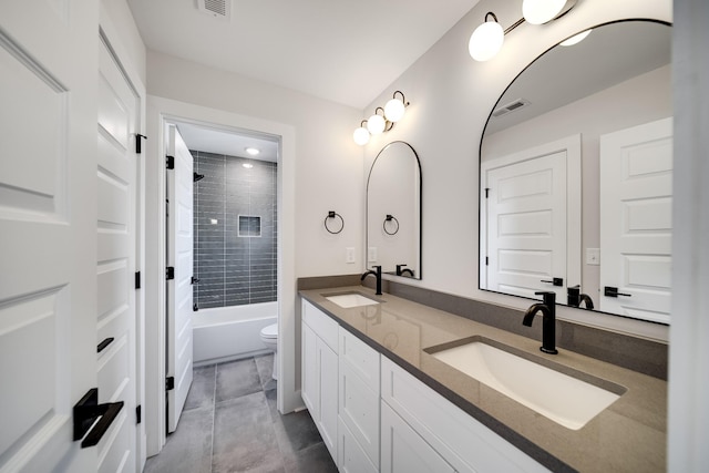 full bathroom with double vanity, a sink, and visible vents