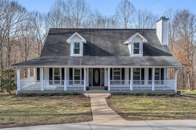 view of front of home featuring roof with shingles, a porch, and a front lawn