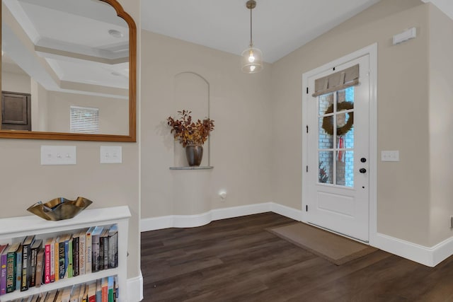 entrance foyer featuring dark wood-style floors and baseboards