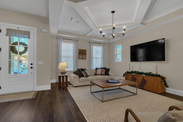 living room featuring baseboards, coffered ceiling, wood finished floors, and a chandelier